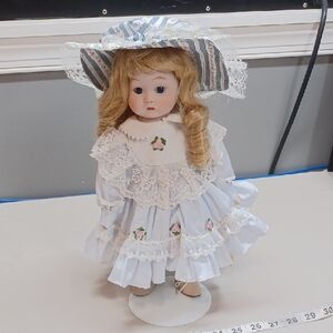 Brinn's Collectible Porcelain Doll with Blue Dress and Hat